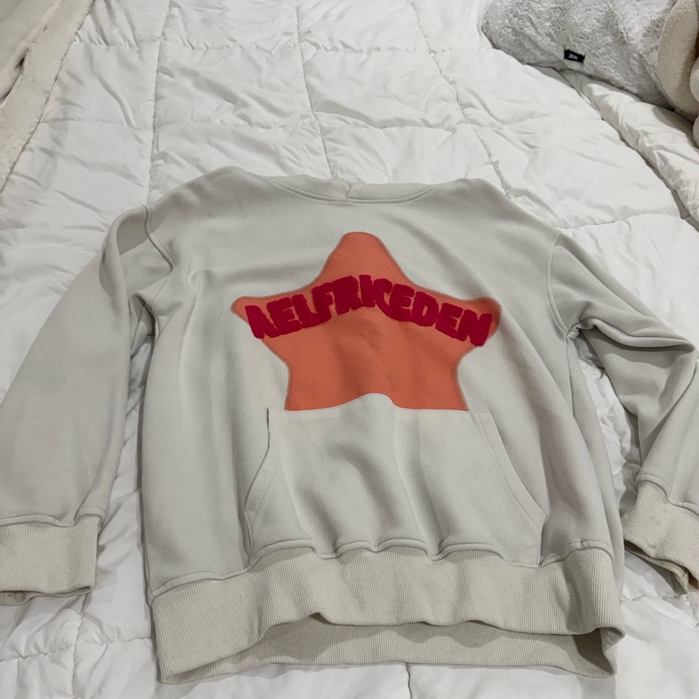 Neufrieden Beige Sweatshirt with Orange Star